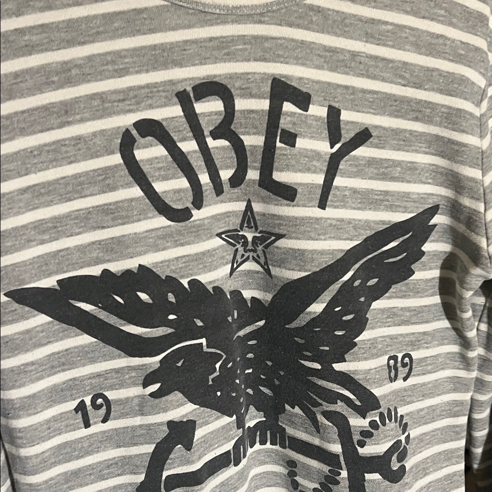 Obey Gray and White Striped Eagle Long sleeve sweat shirt.